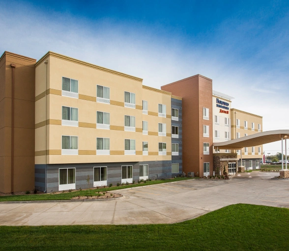 a building with a parking lot.